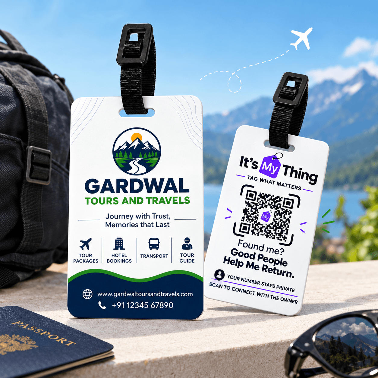 A co-branded Gardwal Tours and Travels luggage tag beside an It's My Thing QR tag, next to a backpack, passport and sunglasses